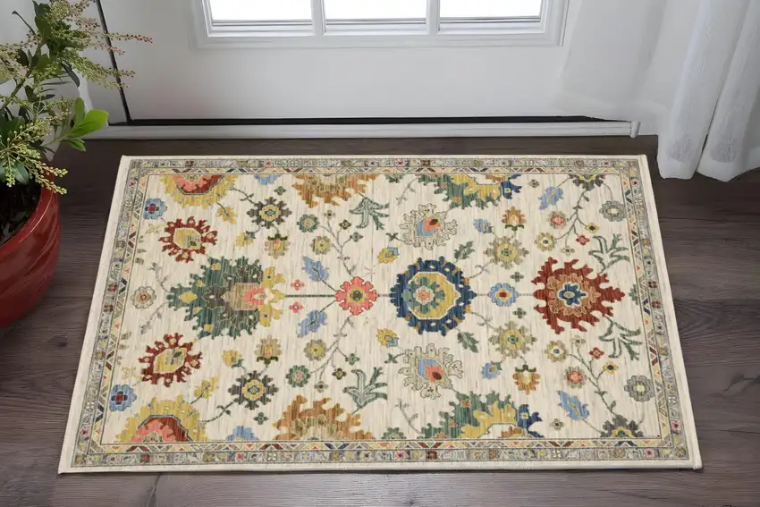 Ivory Red And Blue Oriental Area Rug With Fringe Photo 1