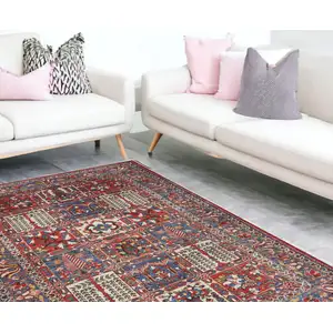 Photo of Ivory Red And Blue Oriental Distressed Non Skid Area Rug