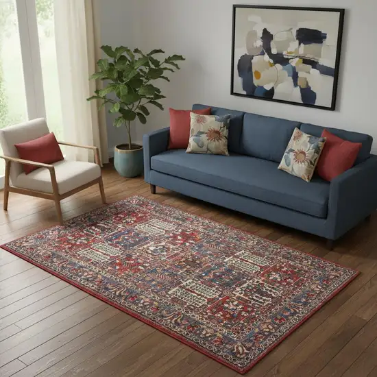 Ivory Red And Blue Oriental Distressed Non Skid Area Rug Photo 1