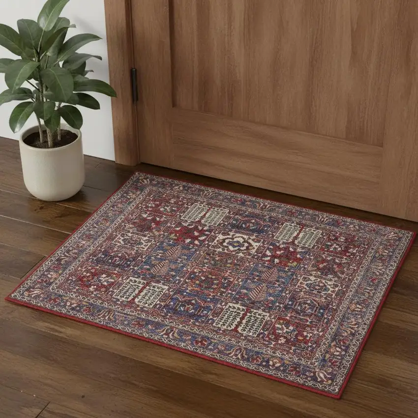 Ivory Red And Blue Oriental Distressed Non Skid Area Rug Photo 1