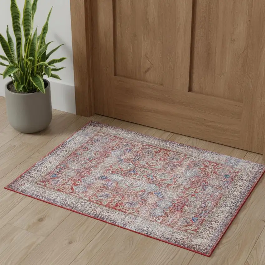 Ivory Red And Blue Oriental Distressed Non Skid Area Rug Photo 1