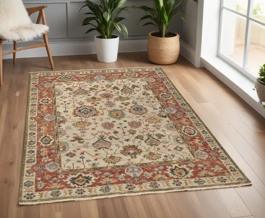 Red and Ivory Wool Floral Hand Knotted Area Rug Photo 1