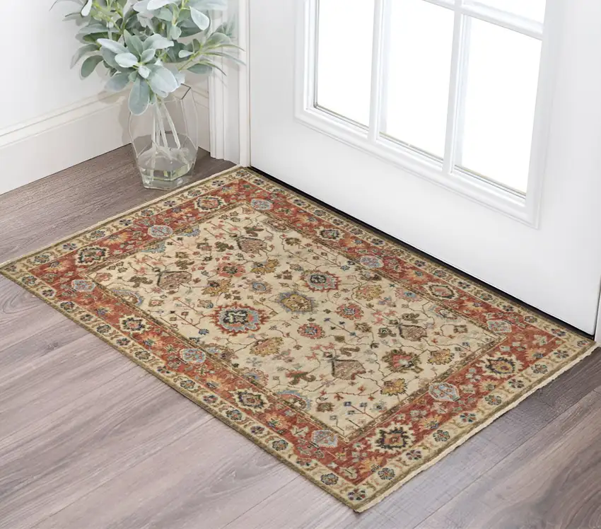 Red and Ivory Wool Floral Hand Knotted Area Rug Photo 1