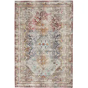 Photo of Ivory Red And Orange Geometric Distressed Area Rug