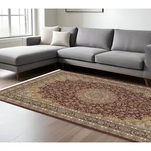 Photo of Ivory Red And Orange Medallion Area Rug With Fringe