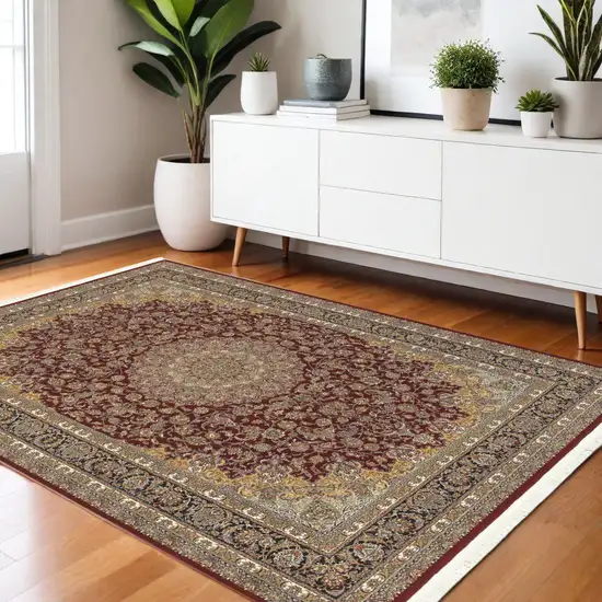 Ivory Red And Orange Medallion Area Rug With Fringe Photo 1