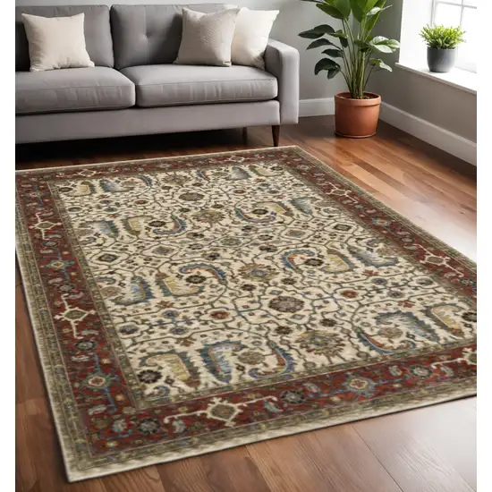 Ivory Red Green Grey Blue And Navy Oriental Power Loom Stain Resistant Area Rug With Fringe Photo 1