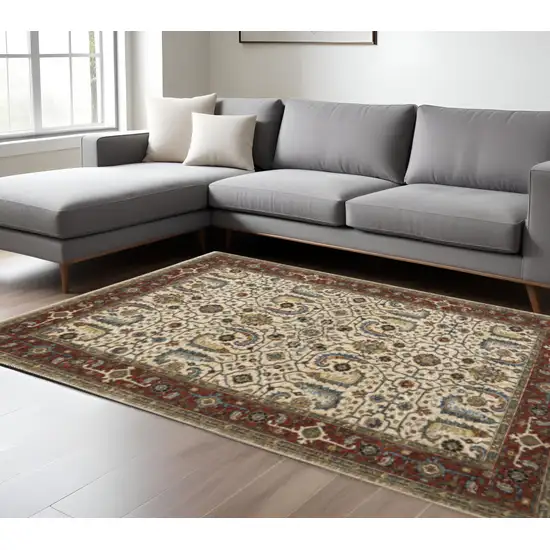 Ivory Red Green Grey Blue And Navy Oriental Power Loom Stain Resistant Area Rug With Fringe Photo 1