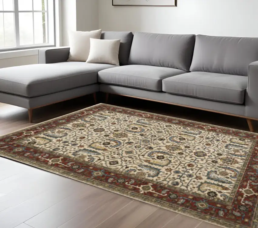 Ivory Red Green Grey Blue And Navy Oriental Power Loom Stain Resistant Area Rug With Fringe Photo 1