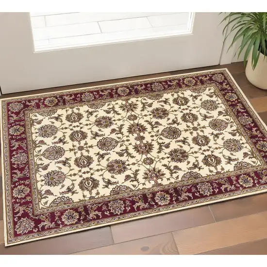 Red Ivory And Brown Floral Medallion Area Rug Photo 1