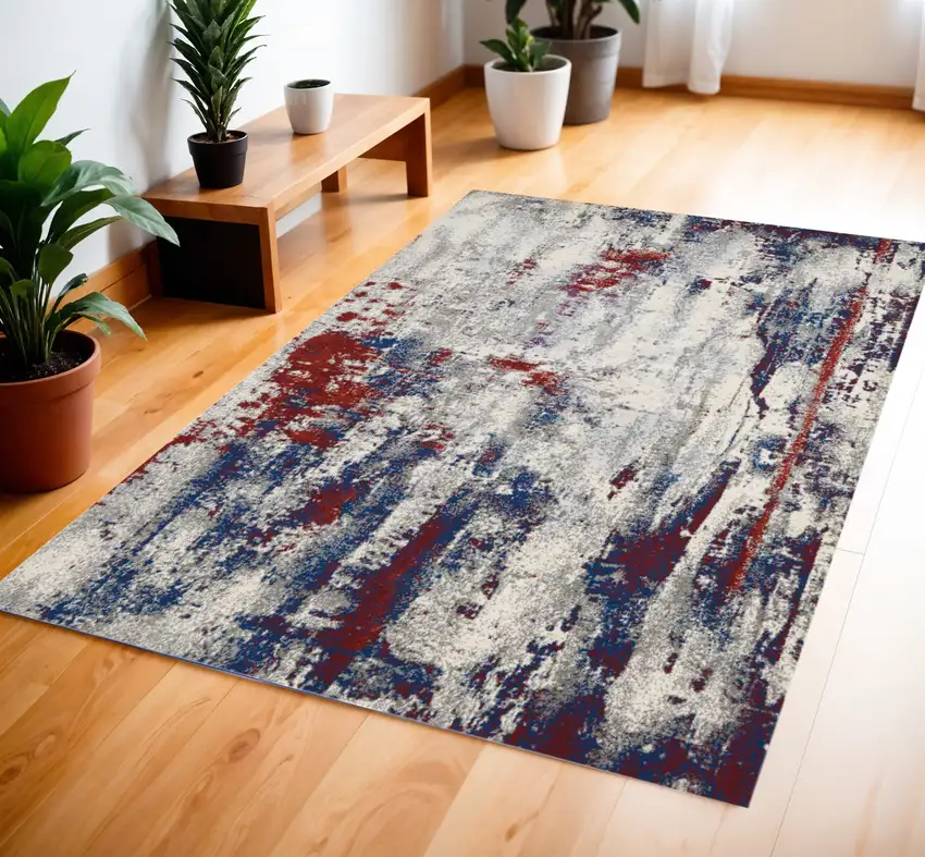 Ivory Red and Blue Abstract Area Rug Photo 1