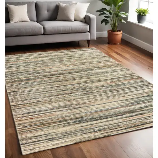 Ivory And Sage Abstract Area Rug Photo 1