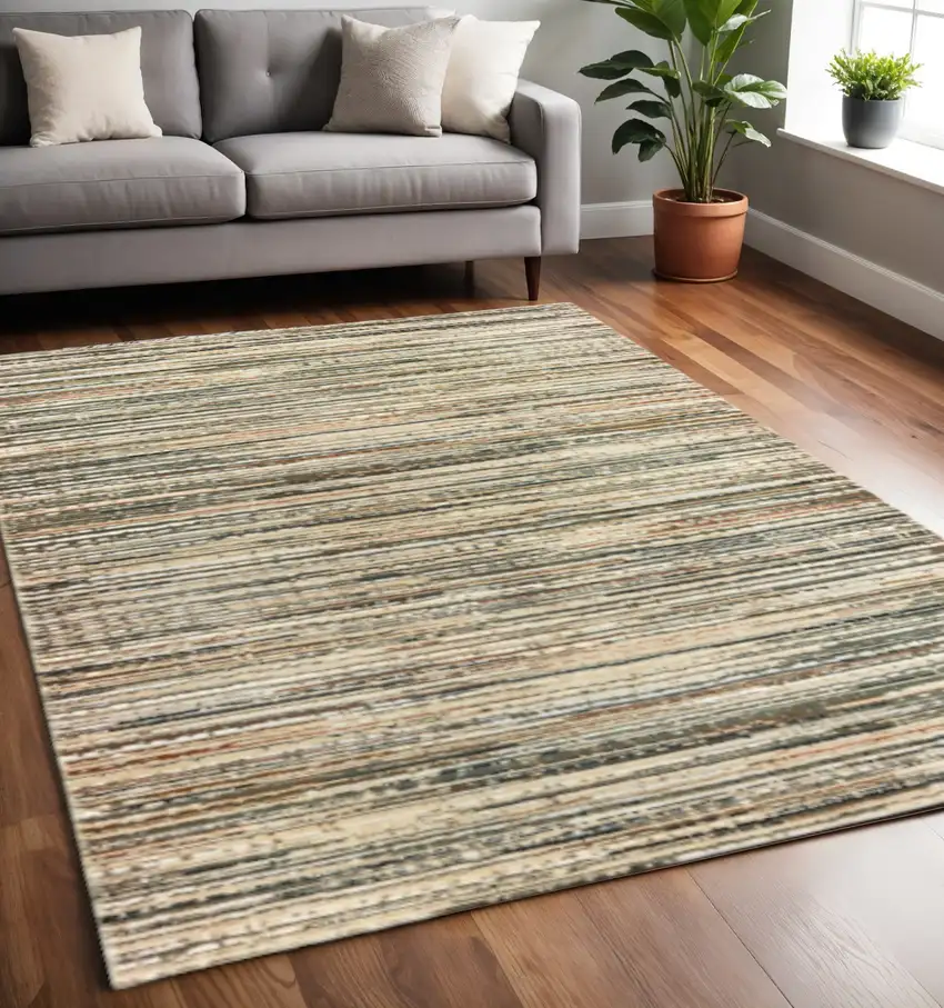 Ivory And Sage Abstract Area Rug Photo 1