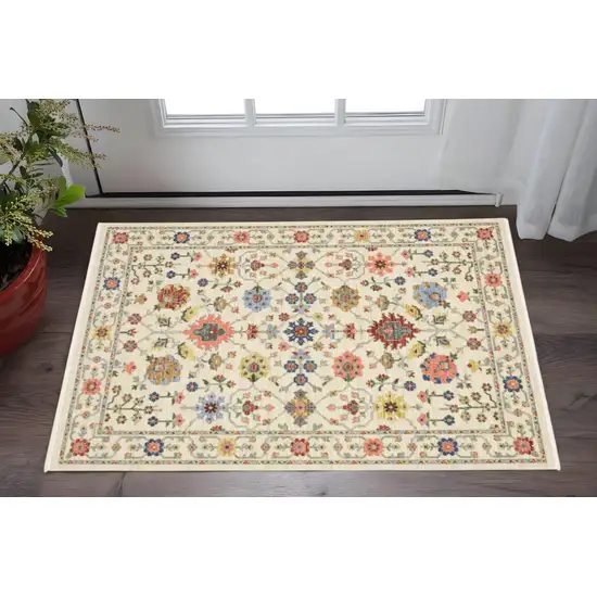 Ivory Salmon Pink Gold Blues Grey Rust And Green Oriental Power Loom Stain Resistant Area Rug With Fringe Photo 1