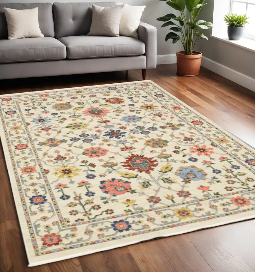 Ivory and Blue Oriental Power Loom Area Rug With Fringe Photo 1