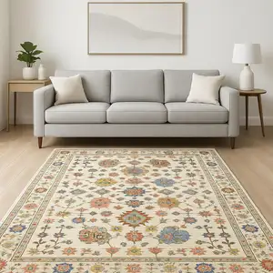 Photo of Ivory Salmon Pink Gold Blues Grey Rust And Green Oriental Power Loom Stain Resistant Area Rug With Fringe