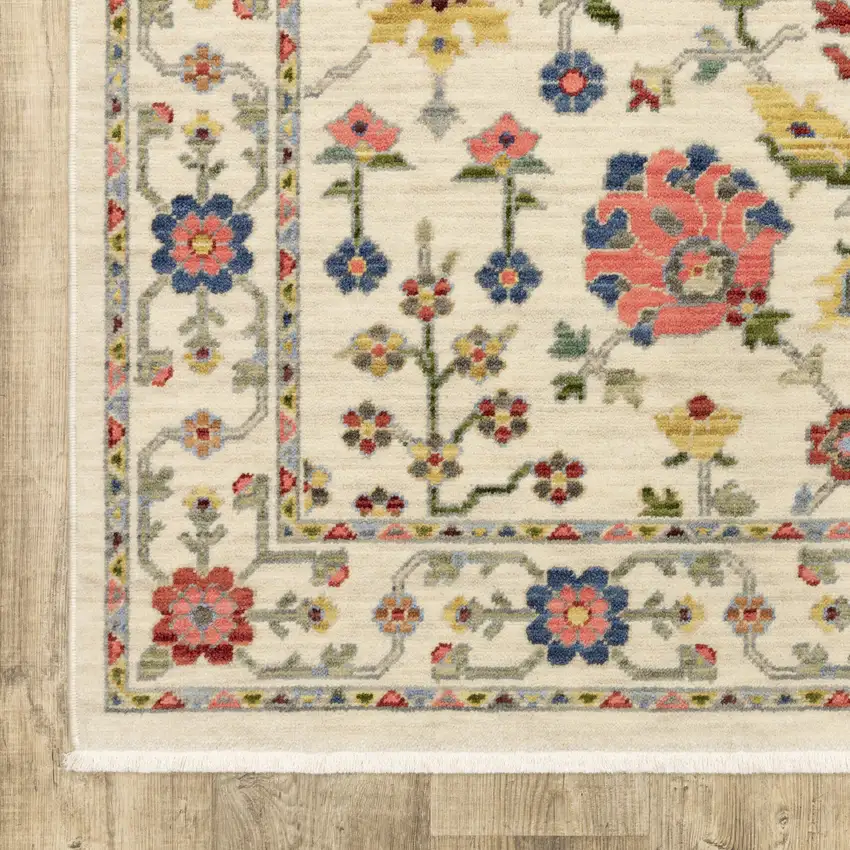 6' X 9' Ivory Salmon Pink Gold Blues Grey Rust And Green Oriental Power Loom Stain Resistant Area Rug With Fringe Photo 4