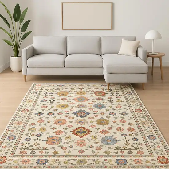Ivory Salmon Pink Gold Blues Grey Rust And Green Oriental Power Loom Stain Resistant Area Rug With Fringe Photo 1