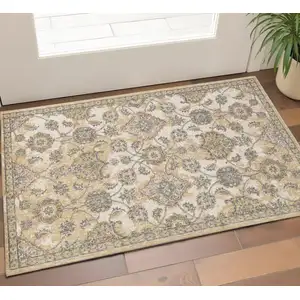 Photo of Ivory Sand Machine Woven Bordered Floral Vines Indoor Area Rug