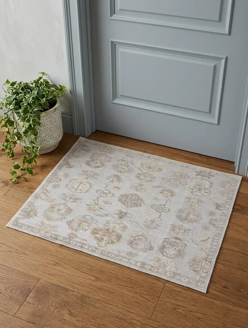 Ivory Silver And Tan Floral Hand Knotted Stain Resistant Area Rug Photo 1