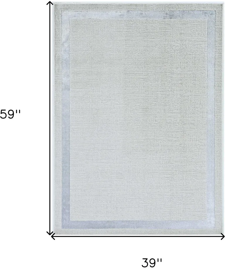 Ivory Silver Machine Woven Bordered Indoor Area Rug Photo 2