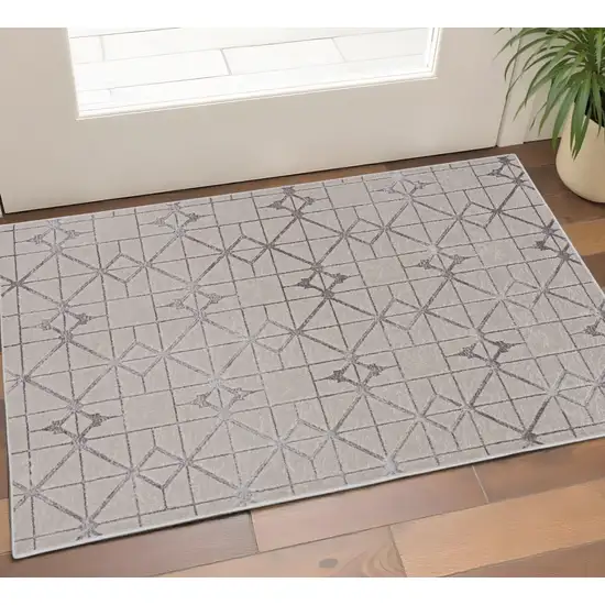 Ivory And Brown Geometric Area Rug Photo 1