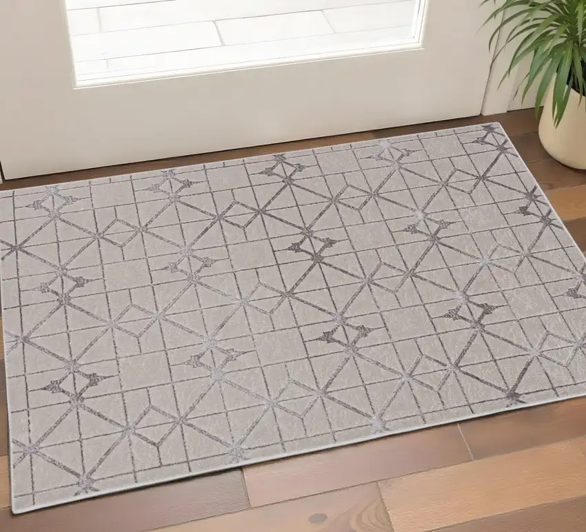 Ivory And Brown Geometric Area Rug Photo 1