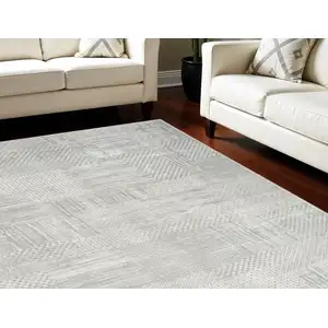 Photo of Ivory Silver and Gray Abstract Non Skid Area Rug