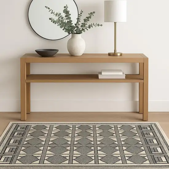 Ivory Tan And Black Geometric Area Rug Photo 1