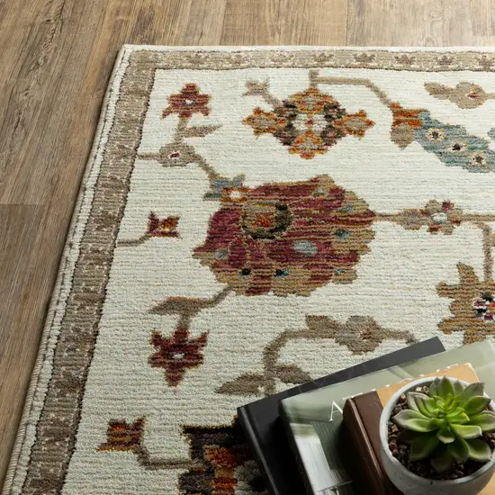 Ivory Tan And Black Oriental Area Rug Photo 5