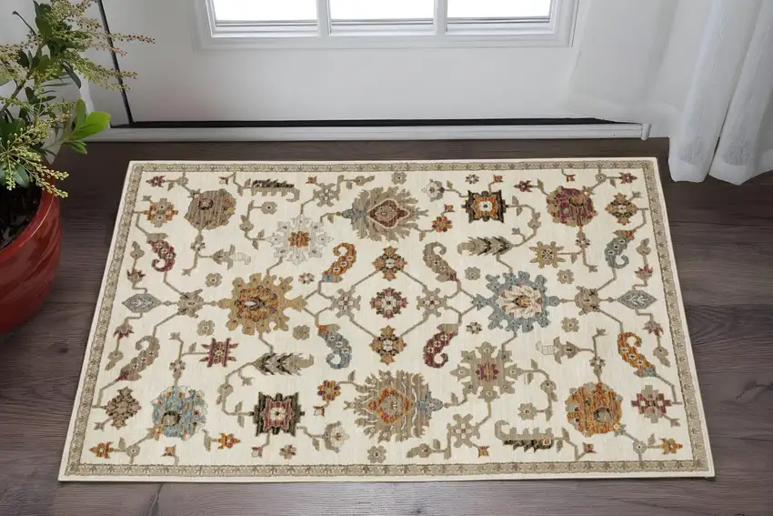 Ivory Tan And Black Oriental Area Rug Photo 1