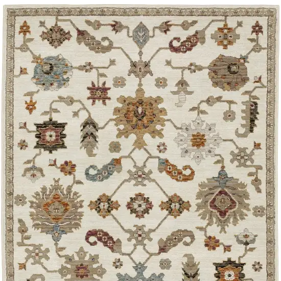 Ivory Tan And Black Oriental Area Rug Photo 4