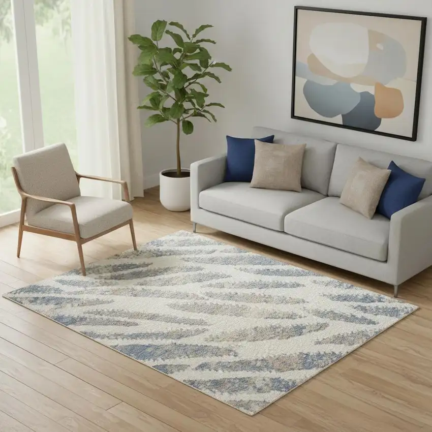 Ivory Tan And Blue Abstract Area Rug Photo 1