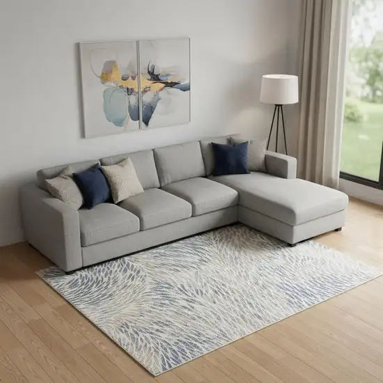 Ivory Tan And Blue Abstract Area Rug Photo 1