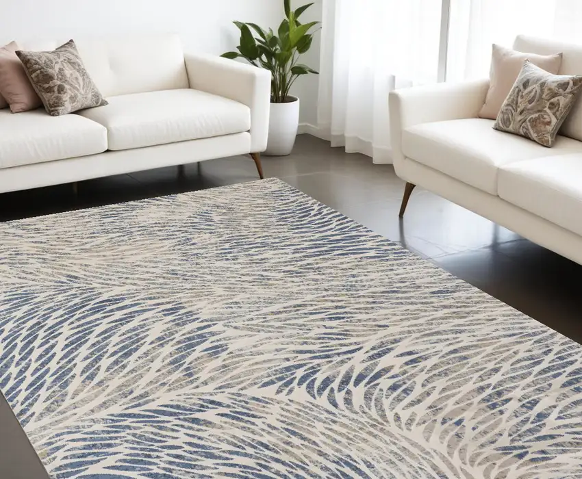 Ivory Tan And Blue Abstract Area Rug Photo 1