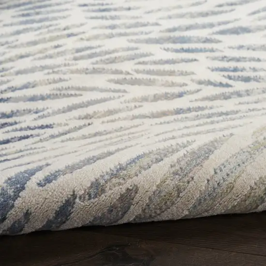 Ivory Tan And Blue Abstract Area Rug Photo 9