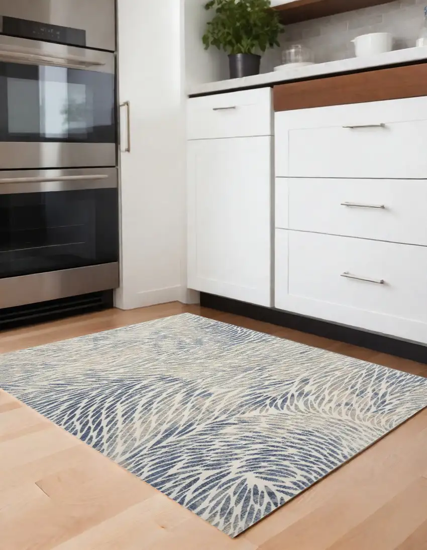 Ivory Tan And Blue Abstract Area Rug Photo 1