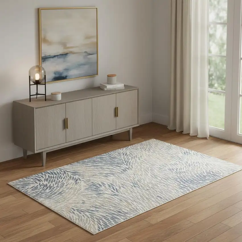 Ivory Tan And Blue Abstract Area Rug Photo 1