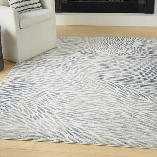 Ivory Tan And Blue Abstract Area Rug Photo 4