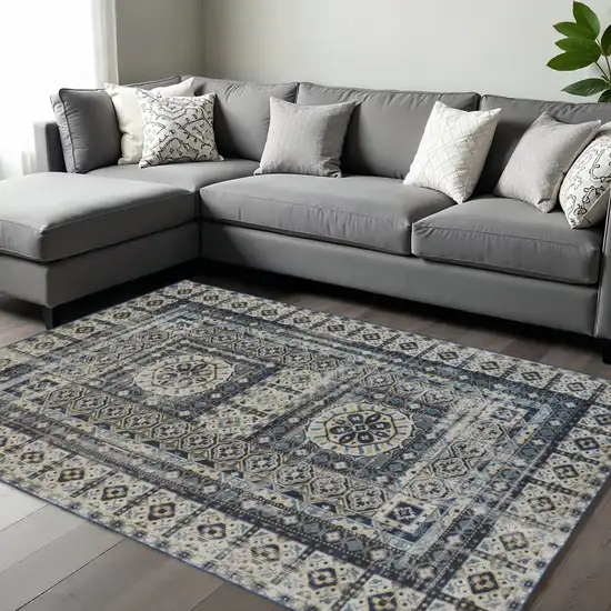 Ivory And Blue Medallion Distressed Area Rug Photo 1