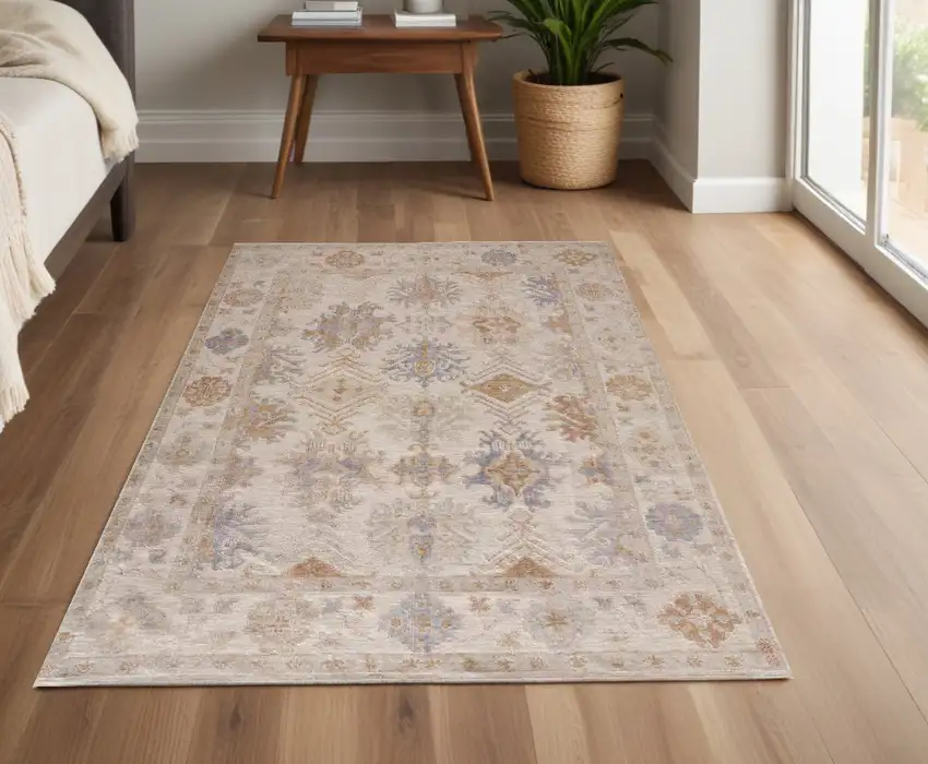 Ivory Tan And Blue Floral Hand Knotted Stain Resistant Area Rug Photo 1
