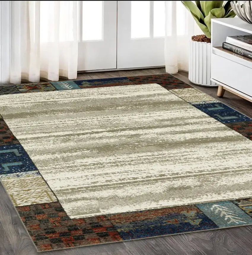 Ivory Tan And Blue Patchwork Area Rug Photo 1