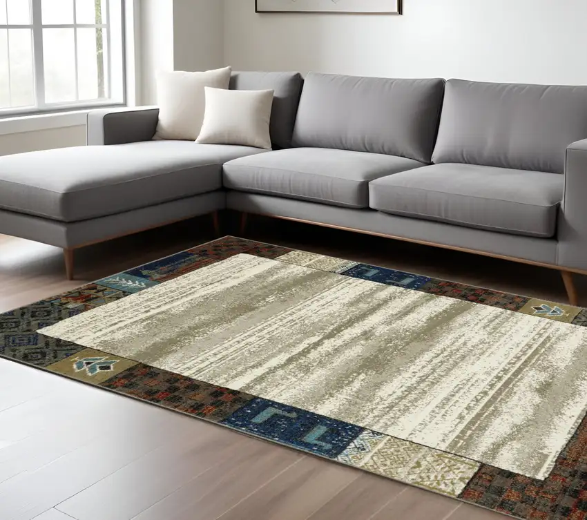 Ivory Tan And Blue Patchwork Area Rug Photo 1