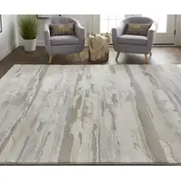 Photo of Ivory Tan And Brown Abstract Power Loom Distressed Stain Resistant Area Rug