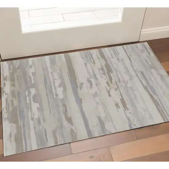 Brown Ivory And Tan Abstract Distressed Area Rug Photo 1