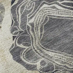 Photo of Ivory Tan And Charcoal Geometric Washable Area Rug With UV Protection