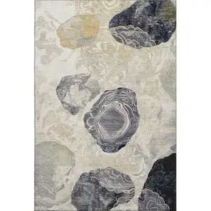 Photo of Ivory Tan And Charcoal Geometric Washable Area Rug With UV Protection