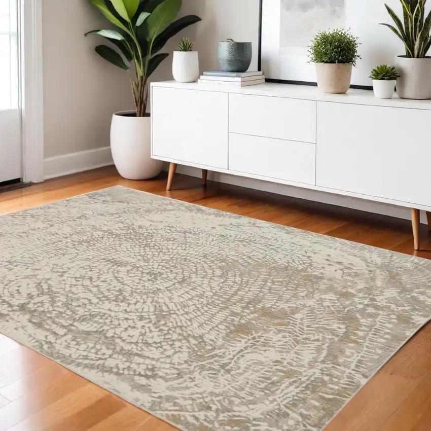 Gray Ivory And Tan Abstract Area Rug Photo 1