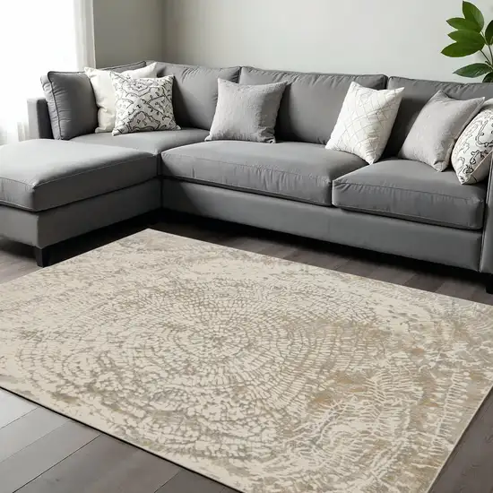 Gray Ivory And Tan Abstract Area Rug Photo 1