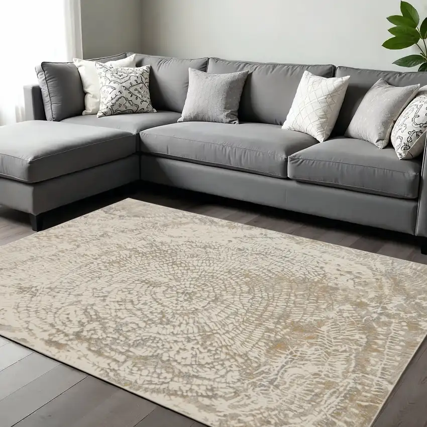 Gray Ivory And Tan Abstract Area Rug Photo 1